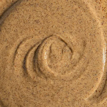 Mandelcreme mit weißer Schokolade und Kokosraspeln